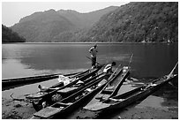 Dugout boats on the shore of Ba Be Lake. Northeast Vietnam ( black and white)