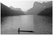 Fisherman on Dugout boat,  Ba Be Lake. Northeast Vietnam ( black and white)