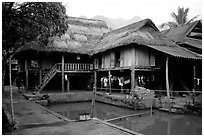 Stilt houses with thatched roofs of Ban Lac village. Northwest Vietnam ( black and white)