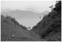 House and misty ridges between Moc Chau and Yeu Chau. Northwest Vietnam (black and white)