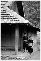 Two Hmong boys outside their house in Xa Linh village. Northwest Vietnam (black and white)