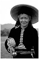 Thai woman wearing her traditional dress under the Vietnamese conical hat, near Son La. Northwest Vietnam ( black and white)