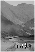 Villagers walking on the road, near Tuan Giao. Northwest Vietnam ( black and white)