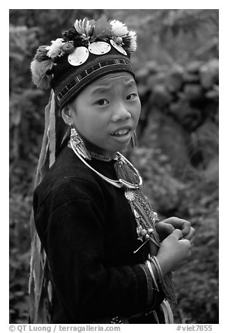 Boy of the Black Dzao minority wearing a hat with three decorative coins, between Tam Duong and Sapa. Vietnam