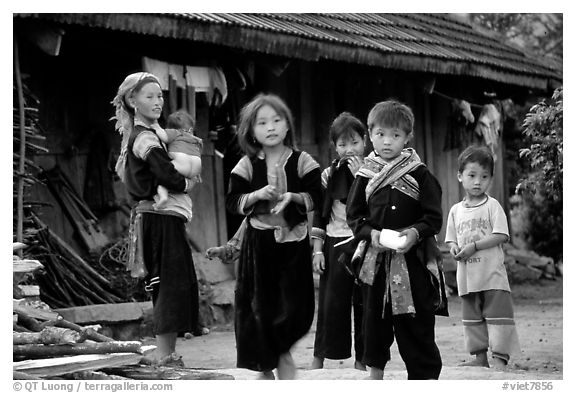 Hmong family in front of their home, near Tam Duong. Northwest Vietnam (black and white)