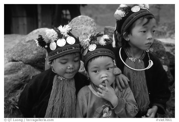 Black Dzao children wearing the hat with three coins, between Tam Duong and Sapa. Northwest Vietnam (black and white)