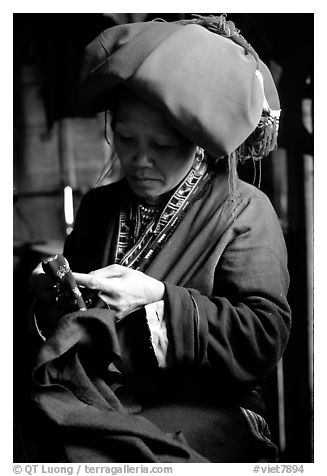 Red Dzao women sewing. Vietnam (black and white)