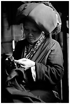Red Dzao women sewing. Vietnam (black and white)