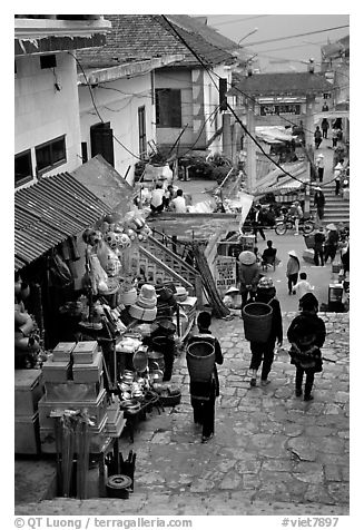 Black Hmong people in the steep streets of Sapa. Sapa, Vietnam (black and white)