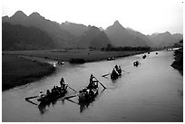 Pilgrims returning. Perfume Pagoda, Vietnam (black and white)
