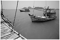 Fishing boats in the China sea. Hong Chong Peninsula, Vietnam ( black and white)