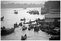 Busy river  at sunrise. Can Tho, Vietnam ( black and white)
