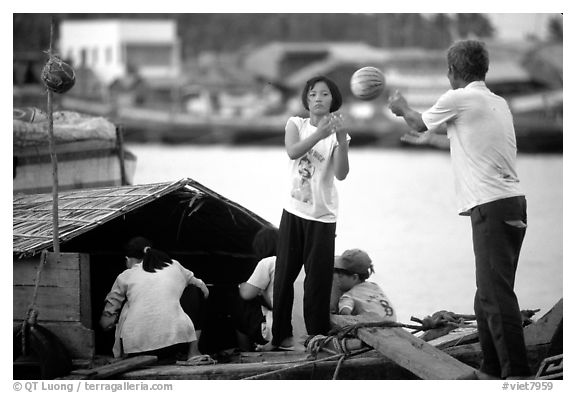 Unloading watermelons from a boat. Ha Tien, Vietnam