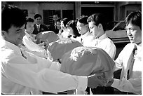 Gifts are exchanged in front of the bride's home. Ho Chi Minh City, Vietnam ( black and white)