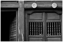 Detail of a wooden facade, Hoi An. Hoi An, Vietnam ( black and white)