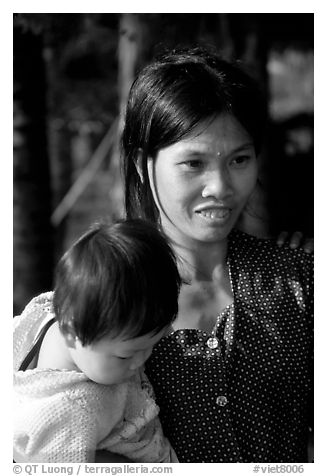 Young mother and child, near Ben Tre. Vietnam (black and white)