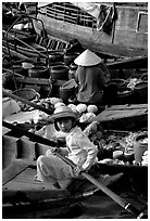 Child at Phung Hiep floating market. Can Tho, Vietnam (black and white)