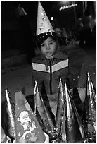 Child on Christmas night. Ho Chi Minh City, Vietnam ( black and white)