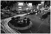 Intersection of Le Loi and Nguyen Hue boulevards at night. Ho Chi Minh City, Vietnam (black and white)