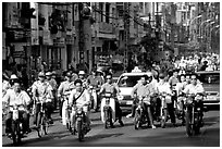 Traffic: there are 2 million motorcycles and the number of cars is growing everyday. Ho Chi Minh City, Vietnam ( black and white)