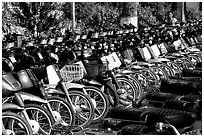 With that many motorcycles, valet parking is necessary. Ho Chi Minh City, Vietnam (black and white)