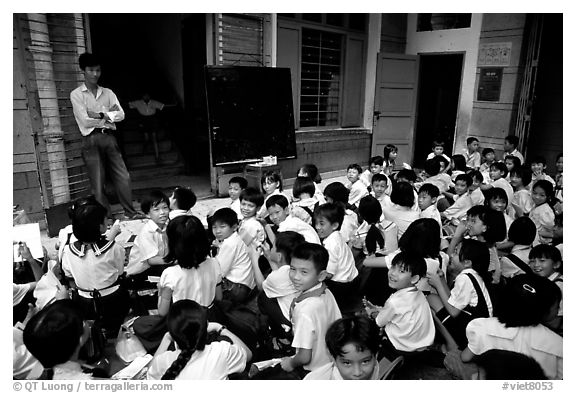 Children at school. Like everywhere else in Asia, uniforms are the norm. Ho Chi Minh City, Vietnam
