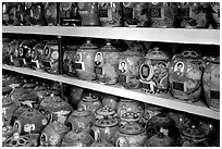 Cremation is popular. Ashes are collected in individual funeral urns. Ho Chi Minh City, Vietnam (black and white)