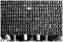 Pictures of the deceased for veneration on altar. Ho Chi Minh City, Vietnam ( black and white)