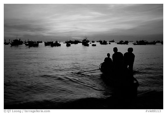 Fishing boat fleet at sunset. Vung Tau, Vietnam (black and white)
