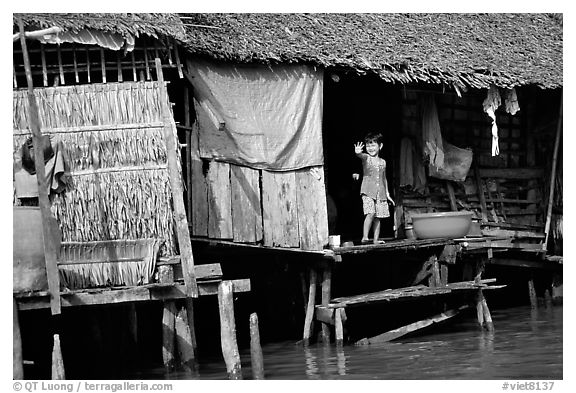 Housing at the edge of the canal, Phung Hiep. Can Tho, Vietnam (black and white)