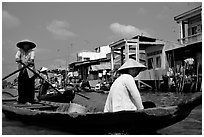 River at the back of townhouses, more used than the road at the front, Phung Hiep. Can Tho, Vietnam ( black and white)