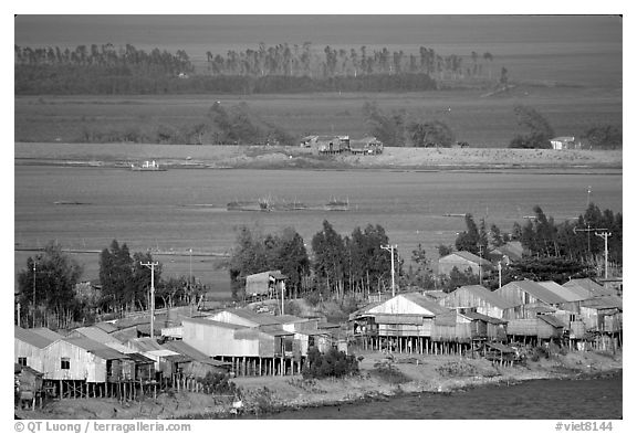 Stilts houses and inundated rice fields. Chau Doc, Vietnam (black and white)
