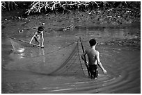 Fishing the river, near Long Xuyen. Mekong Delta, Vietnam (black and white)