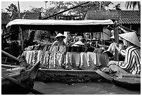 Garnments for sale on the Phong Dien floating market. Can Tho, Vietnam ( black and white)