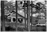 Basque style villa of colonial period in the pine-covered hills. Da Lat, Vietnam (black and white)