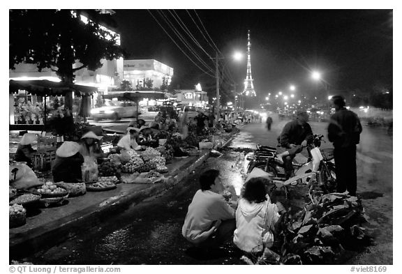 Night market and the local Eiffel tower. Da Lat, Vietnam (black and white)