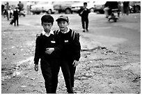 School children wear French-style chic sweaters. Da Lat, Vietnam ( black and white)