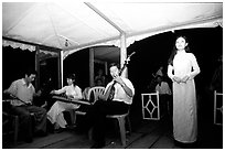 Traditional floating concert on the Perfume river. The city has remained Vietnam's artistic center. Hue, Vietnam ( black and white)