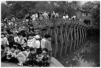 School children at The Huc bridge, Hoan Kiem lake. Hanoi, Vietnam ( black and white)