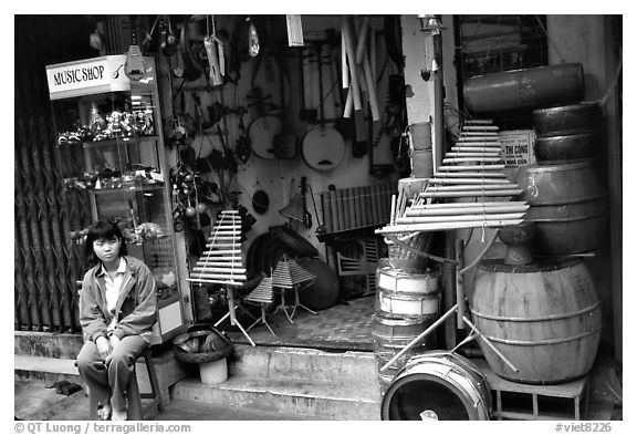 Traditional musical instruments for sale, old quarter. Hanoi, Vietnam (black and white)