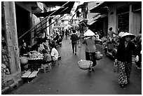 Street scene in the old city. Hanoi, Vietnam (black and white)