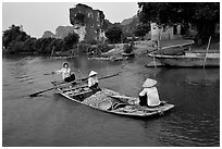 Villagers transport stones from the quary on Ken Ga canal. Ninh Binh,  Vietnam ( black and white)