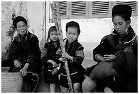 Hmong women kids with sugar cane. Sapa, Vietnam ( black and white)