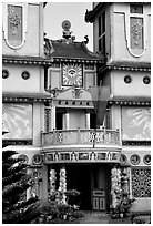 Facade detail of a Cao Dai temple. Ben Tre, Vietnam (black and white)