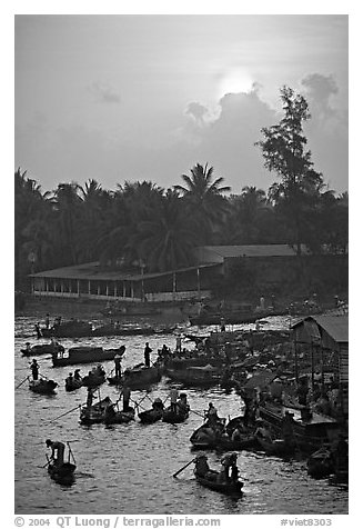 River activity at sunrise. Can Tho, Vietnam (black and white)
