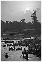 River activity at sunrise. Can Tho, Vietnam ( black and white)