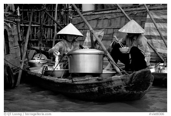 Boat-based food vendors. Can Tho, Vietnam (black and white)