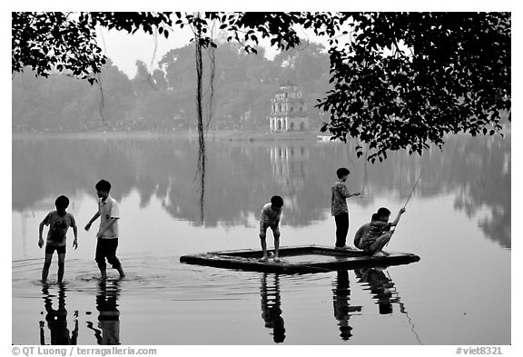 black and white photography of kids playing