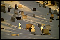 Tombs with crosses in snow. Calgary, Alberta, Canada ( color)
