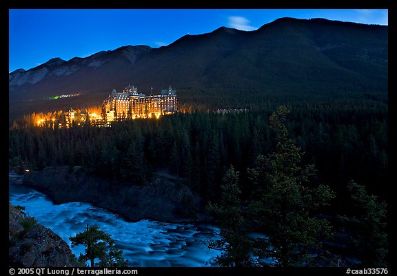 Banff Springs Hotel, Bow River and Falls at night. Banff National Park, Canadian Rockies, Alberta, Canada
